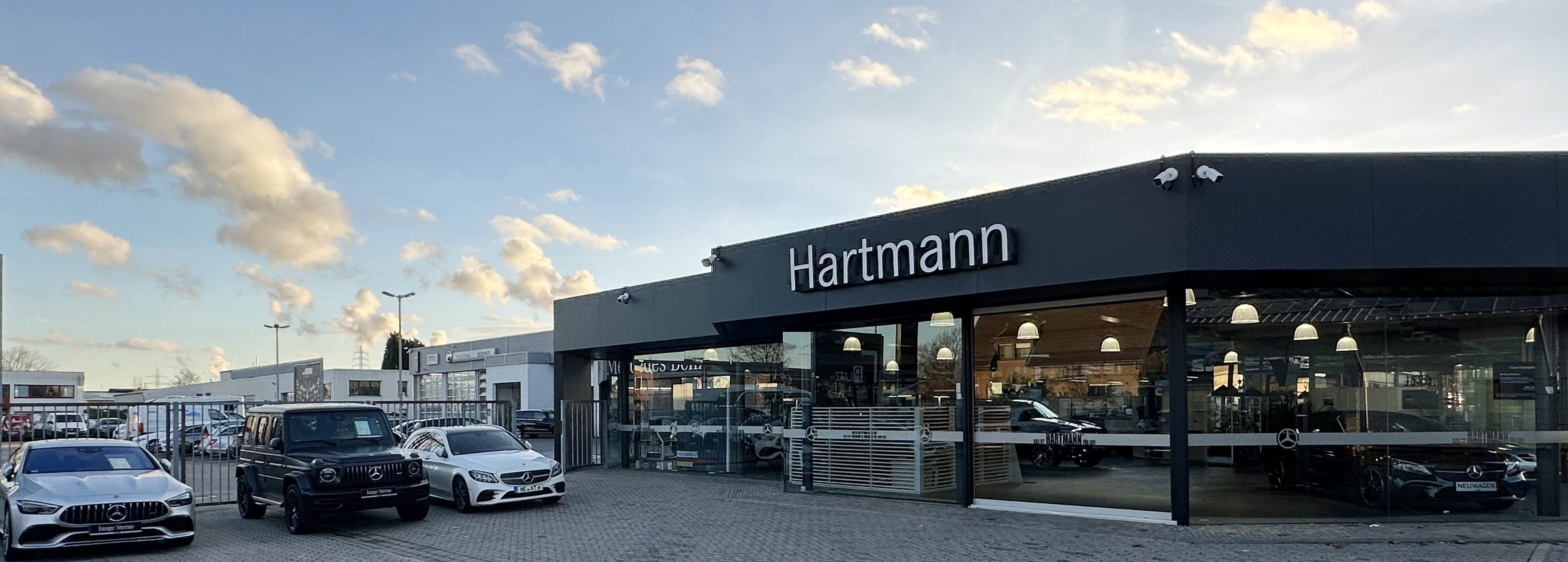 https://www.dasisthartmann.de/mercedes-benz/uploads/tx_hxresponsiveslider/Hartmann_Gebaeude_bearbeitet_1155x414.jpg